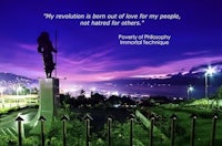 a statue with a quote about the revolution being born out of life, not hated for others